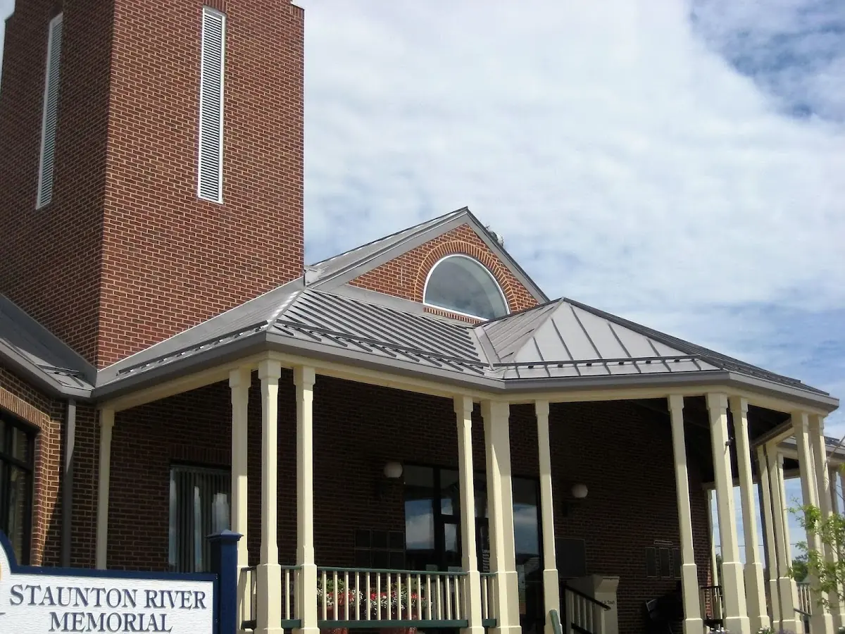 Skilled roofing craftsmen working on a residential roof in Wellington Valley